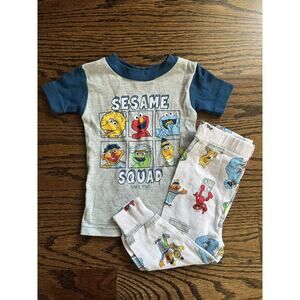Sesame Street, Carter’s lot of pajamas set boy/ girl Sz. 12 mo NWT